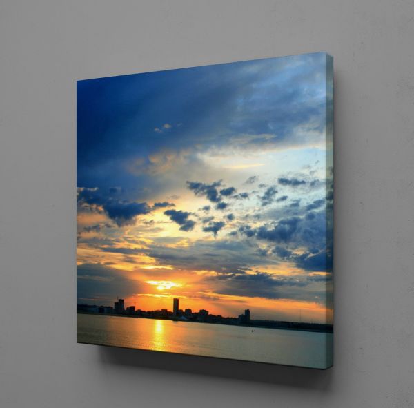 BULUTLU GÖKYÜZÜ ARASINDAN ÇIKAN GÜNEŞ KANVAS TABLO