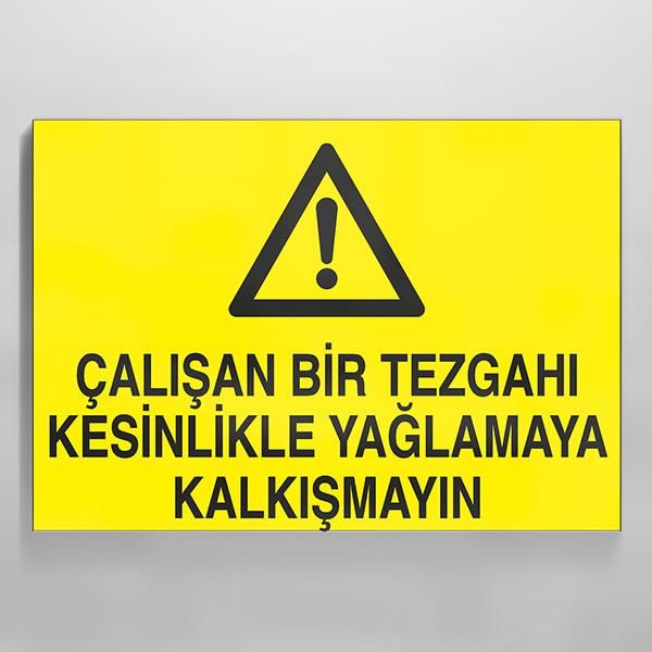 Çalışan Bir Tezgahı Kesinlikle Yağlamaya Kalkışma Uyarı Levhası